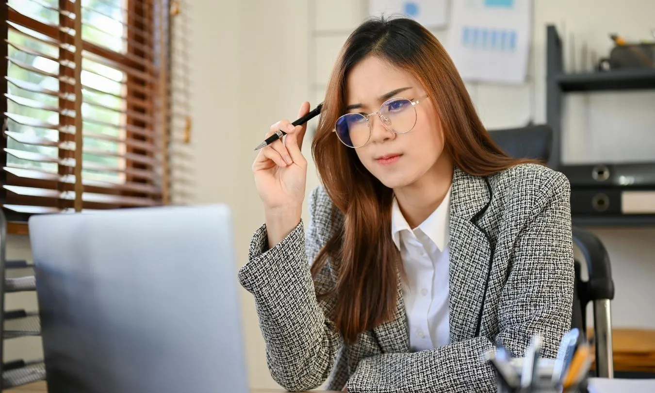 Business owner reviewing marketing analytics